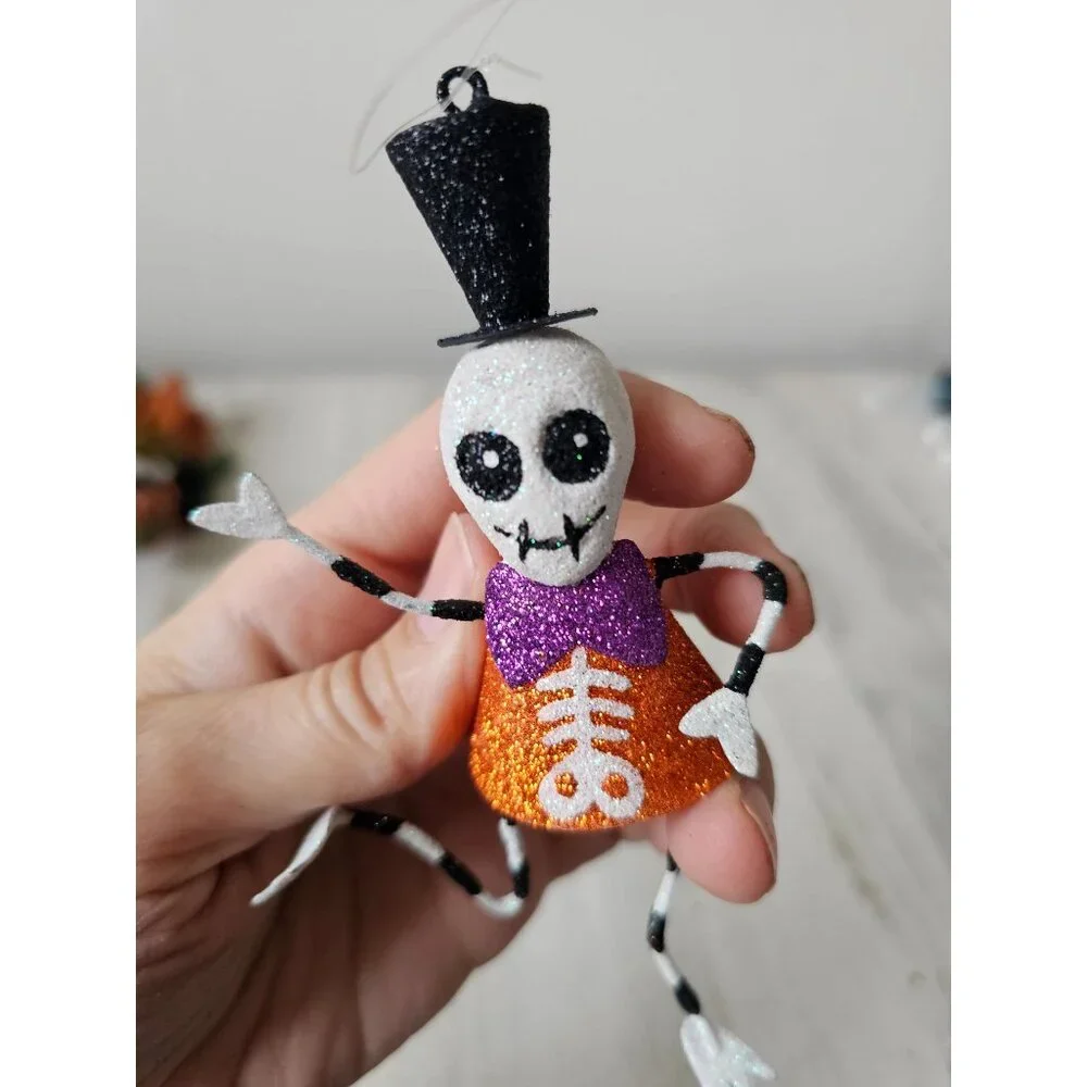 Pier 1 skeleton glitter ornament bow tie top hat Halloween Xmas tree black and w
